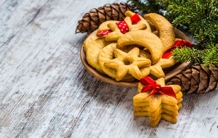 Christmas cookies with ginger decorated with red ribbonの写真素材