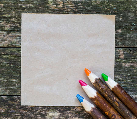 Christmas fir tree with decoration on a wooden boardの写真素材