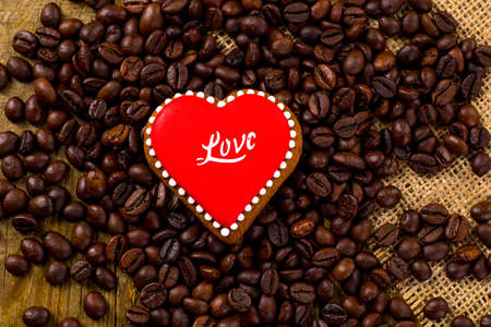 Cup of black tea and heart shaped cookies, for valentine's dayの写真素材