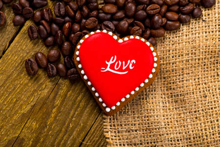 Cup of black tea and heart shaped cookies, for valentine's dayの写真素材