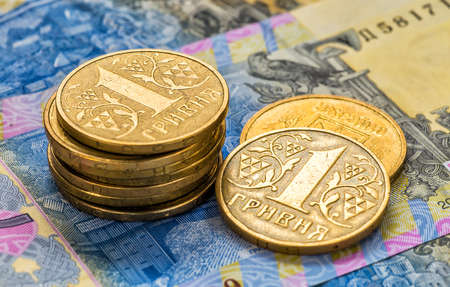 Ukrainian money - coin and hryvniaの写真素材