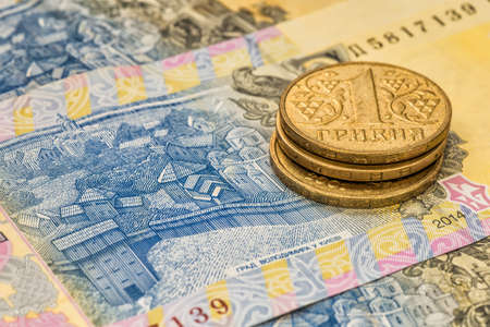Ukrainian money - coin and hryvniaの写真素材