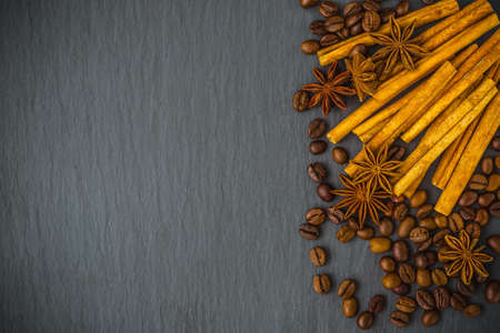 Mulled wine ingredients spices. Anise, cinnamon, cardamom on stone table.の写真素材