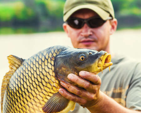 Carp and Fisherman, Carp fishing trophy.