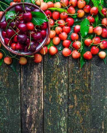 Fresh cherry  on wooden background