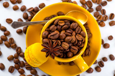 Coffee cup and beans on a white background.の写真素材