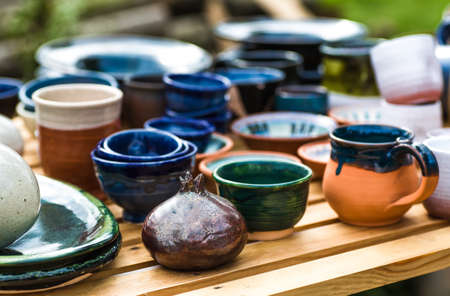 Ukrainian pottery. Different pottery products: bowls, pitchers, plates.の写真素材