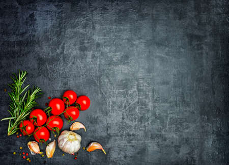 A set of fragrant spices. A mixture of black and red pepper, coriander, paprika. On Wooden background. Top view. Free space.の写真素材