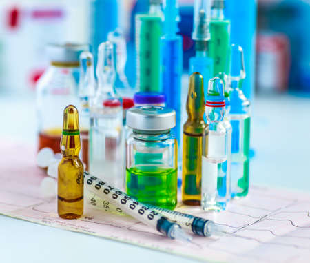 Drug prescription for treatment medication. Pharmaceutical medicament, cure in container for health. Pharmacy theme, capsule pills with medicine antibiotic in packages.の写真素材