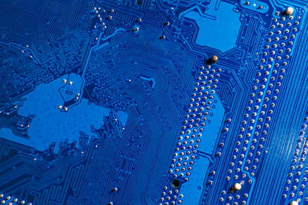 blue circuit board background of computer motherboardの写真素材