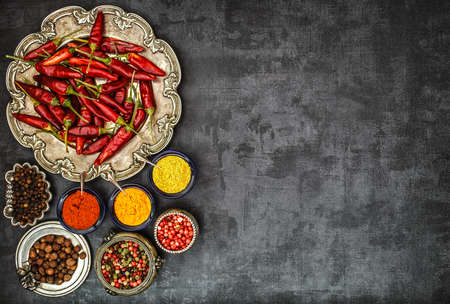 Various spices spoons on stone table. Top view .の写真素材