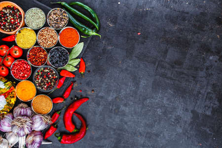 Big set of Indian spices and herbs . On the black chalkboard.の写真素材