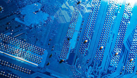 blue circuit board background of computer motherboardの写真素材