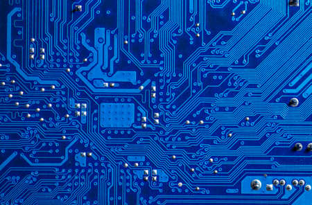 blue circuit board background of computer motherboardの写真素材