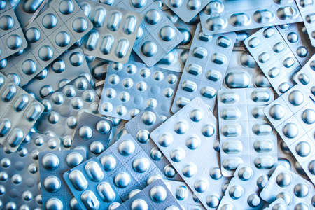 Drug prescription for treatment medication. Pharmaceutical medicament, cure in container for health. Pharmacy theme, capsule pills with medicine antibiotic in packages.の写真素材