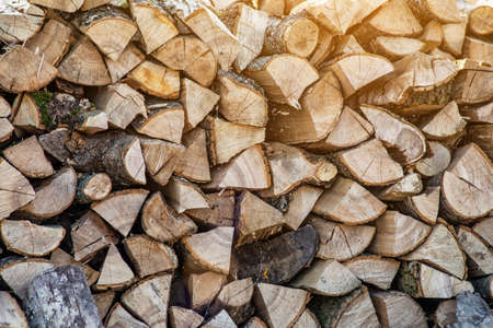Wood burning stove. Firewood for furnace heating. Warehouse for firewood for stove.Natural wooden...