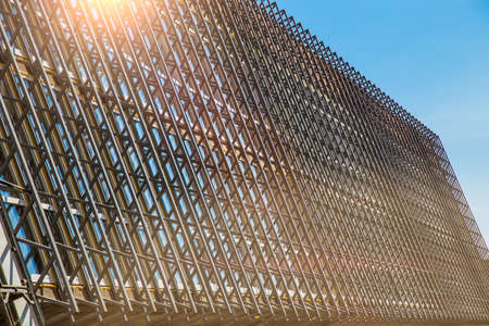 Construction site background. Hoisting cranes and new multi-storey buildings. I.ndustrial...