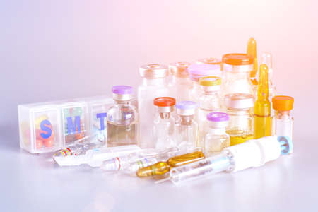 Drug prescription for treatment medication. Pharmaceutical medicament, cure in container for health. Pharmacy theme, capsule pills with medicine antibiotic in packages.の写真素材