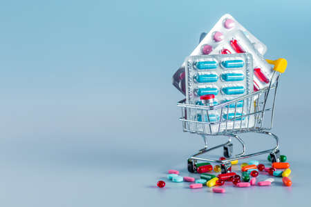 Drug prescription for treatment medication. Pharmaceutical medicament, cure in container for health. Pharmacy theme, capsule pills with medicine antibiotic in packages.の写真素材