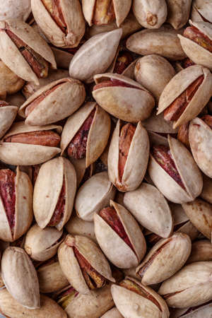 Pistachios texture and background . Tasty pistachios as background,as pistachios texture.Concept of nuts. flat layの写真素材
