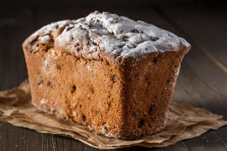 traditional sponge cake.Homemade delicious muffin on wooden background close-up. Cooking baking...
