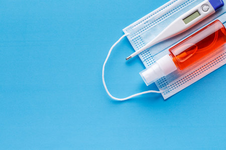 Protective equipment for prevention of virus infection such as hand sanitizer, surgical mask and latex glovesの写真素材