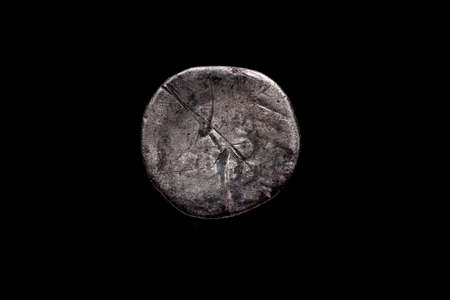 Roman coin, AR Denarius, Vitellius, Rome mint, 69 AD., Ancient roman coin with portrait of emperor isolated on blackの写真素材