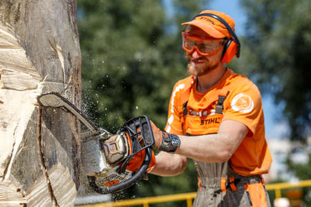 Ukraine Kiev June 22, 2019 Stihl chainsaw in Kiev. Stihl is a German manufacturer of chainsaws and other handheld power equipmentのeditorial素材