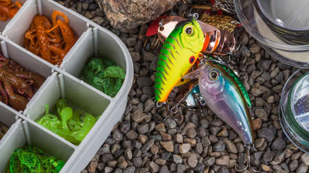 Spain.August 22, 2020. Fishing tackle - fishing spinning, lures and wobblers.Closeup of a fishing box with colorful lures.Fishing in Spain at the Mequinenza reservoir - Ebroの写真素材