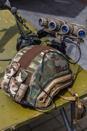 Us military tactical helmet Velcro.Night vision device attached to the helmet. A special device for...
