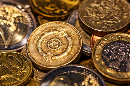 United kingdom Pound coin.British coins stack on black, pound sterling,Business concept.Numismatics. Iron money.Collectionの写真素材