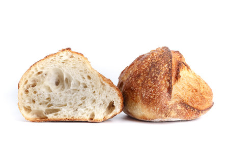 Freshly baked Bread isolated on white background.Healthy bread recipe.Insulated items, baking, side vewの写真素材