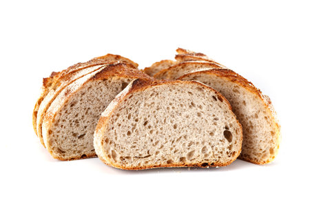 Freshly baked Bread isolated on white background.Healthy bread recipe.Insulated items, baking, side vewの写真素材