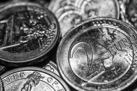 Background of Euro coins money.United kingdom Pound coin.US coins.Numismatics.Group of coins,Business concept. Iron money.Collectionの写真素材