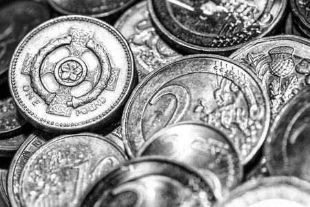 Background of Euro coins money.United kingdom Pound coin.