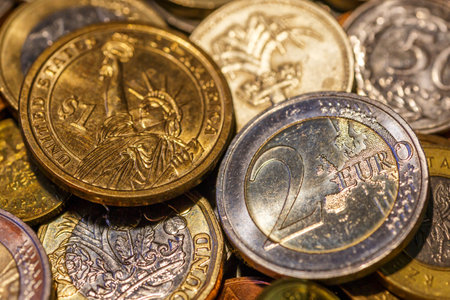 Background of Euro coins money.United kingdom Pound coin.US coins.Numismatics.Group of coins,Business concept. Iron money.Collectionの写真素材