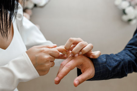 Wedding, she puts on a wedding ringの写真素材