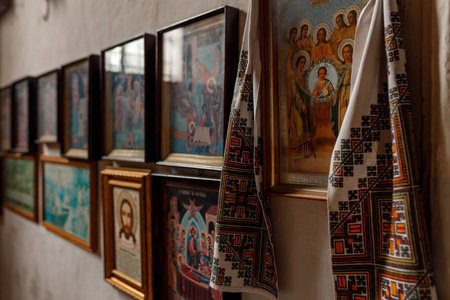 Many church icons hang on the wall in the churchの写真素材