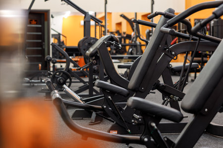 Exercise equipment in an empty gymの写真素材