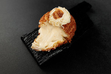 Classic Shu cake (choux). Custard dough based on butter and milk, classic custard filling with added...