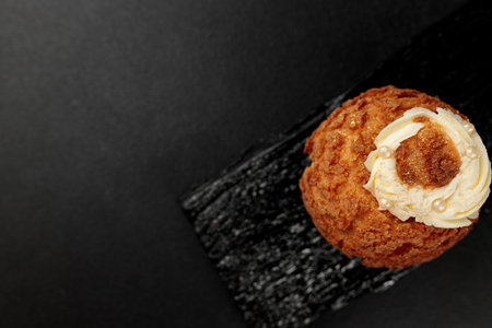 Classic Shu cake (choux). Custard dough based on butter and milk, classic custard filling with added...