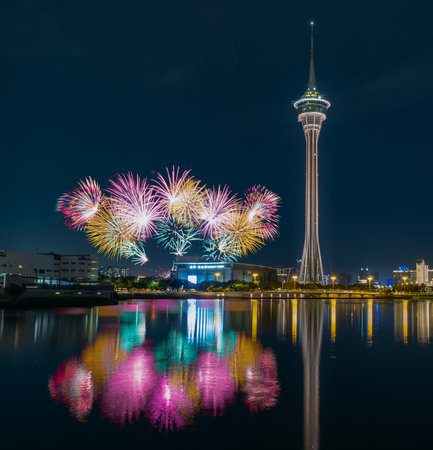 Macau Tower and fireworks display at night.の写真素材