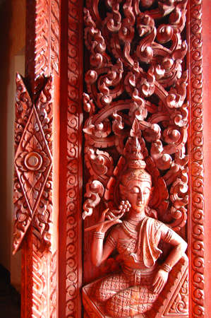Painted and carved temple s doors and windowの写真素材