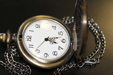 Handheld clock in office