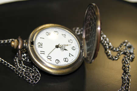 Handheld clock in office