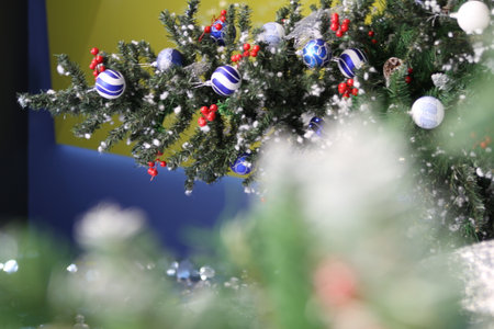 A Christmas tree standing in a shopping mallの写真素材