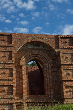 Unfinished church from a red brick grassedの写真素材