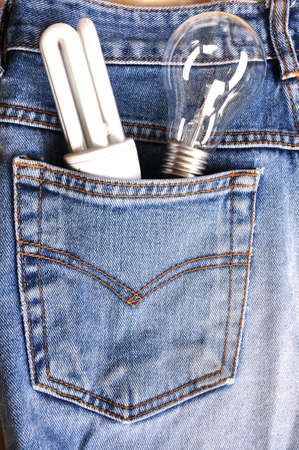 Fluorescent lamp and tungsten lamp on blue jeansの写真素材