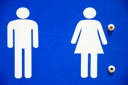 Blue square Recreational Sign with the international symbol for Restroom displayedの写真素材