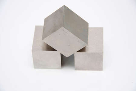 iron cubes isolated on white background の写真素材